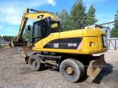 Колесный экскаватор CAT 318, макс. опции. Строительные товары - Покупка/Продажа